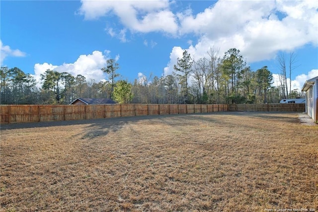 view of yard featuring a fenced backyard