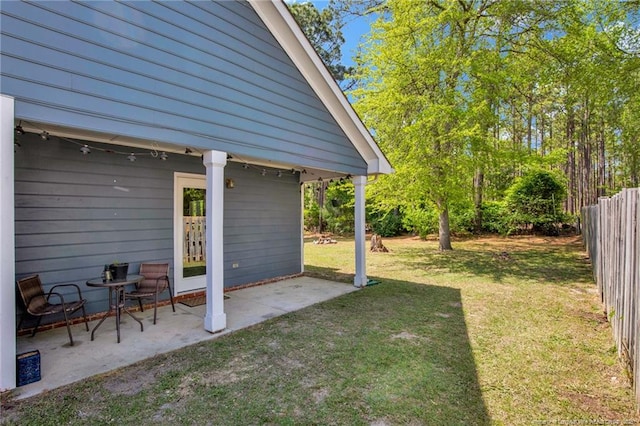 view of yard with a patio area and fence
