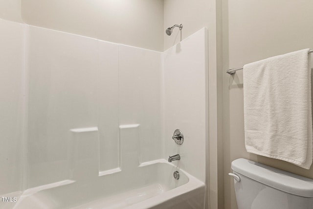 bathroom with toilet and shower / bathtub combination