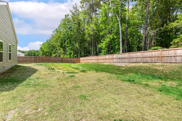 view of yard featuring a fenced backyard