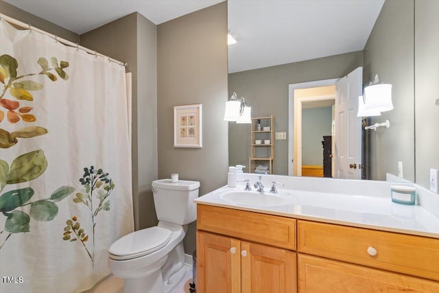 full bath featuring vanity, curtained shower, and toilet
