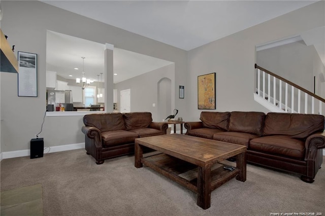 308 Wishaw Ct, Hope Mills, NC 28348 - living area with an inviting chandelier, light carpet, recessed lighting, baseboards, and stairway