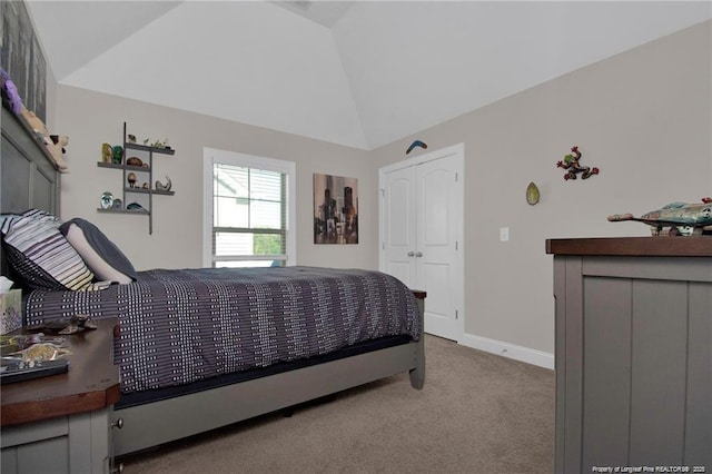 308 Wishaw Ct, Hope Mills, NC 28348 - bedroom with baseboards, vaulted ceiling, and carpet