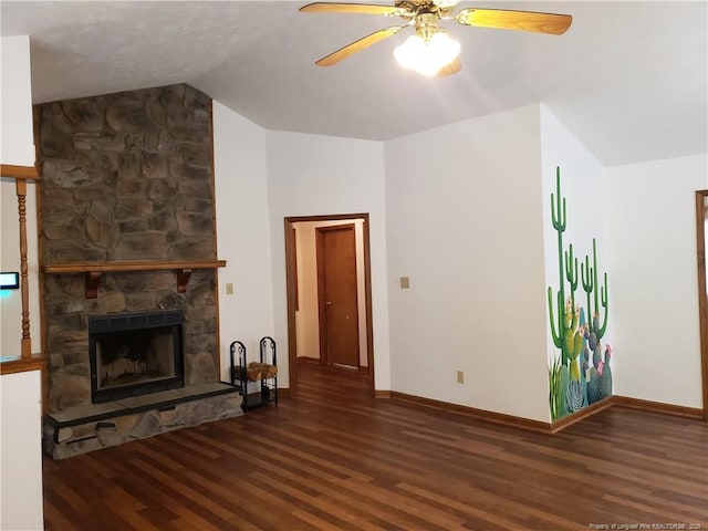 unfurnished living room featuring baseboards, vaulted ceiling, and wood finished floors