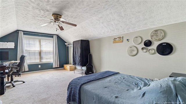bedroom with carpet flooring, a textured ceiling, a ceiling fan, and lofted ceiling