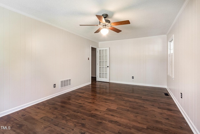 1324 Swallow Dr, Raleigh, NC 27606 - unfurnished room featuring ornamental molding, ceiling fan, dark wood finished floors, and a textured ceiling