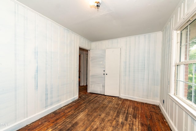 empty room featuring hardwood / wood-style flooring