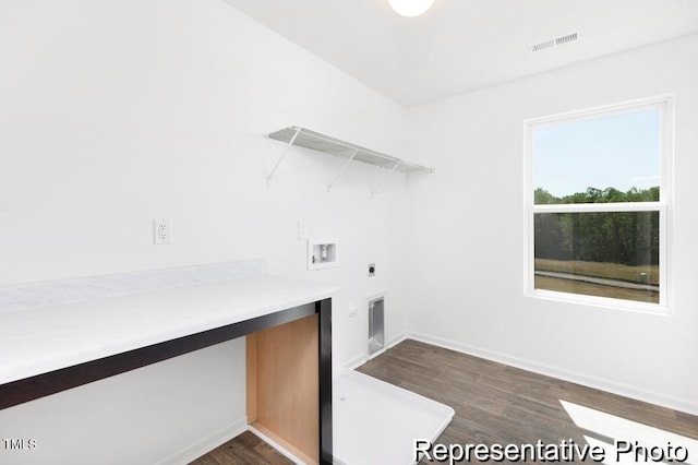 washroom with laundry area, washer hookup, hookup for an electric dryer, dark wood finished floors, and visible vents