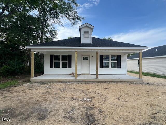 211 E Washington St, Coats, NC 27521 - view of front of home with covered porch