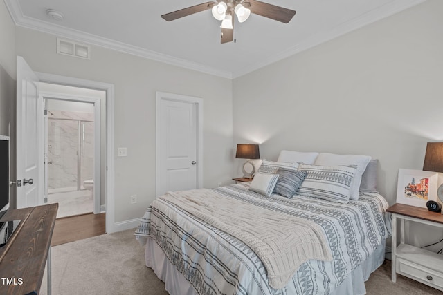 bedroom with crown molding, baseboards, carpet flooring, and ceiling fan