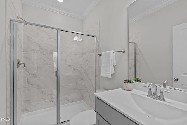 full bathroom with a shower stall, crown molding, toilet, and vanity