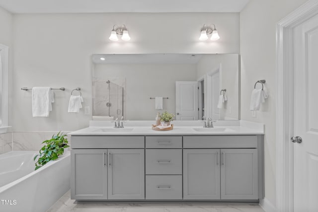 full bathroom with a stall shower, double vanity, a bath, and marble look tiles