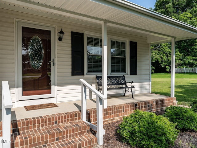1612 Bethlehem Rd, Knightdale, NC 27545 - entrance to property with covered porch and a yard