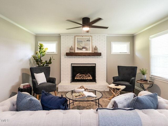1612 Bethlehem Rd, Knightdale, NC 27545 - living area featuring crown molding, wood finished floors, ceiling fan, and a brick fireplace