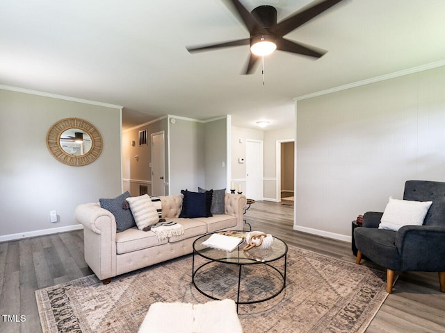 1612 Bethlehem Rd, Knightdale, NC 27545 - living area featuring wood finished floors, ceiling fan, baseboards, and ornamental molding