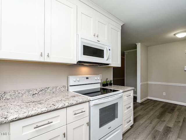 1612 Bethlehem Rd, Knightdale, NC 27545 - kitchen with white appliances, white cabinetry, dark wood finished floors, and light stone countertops