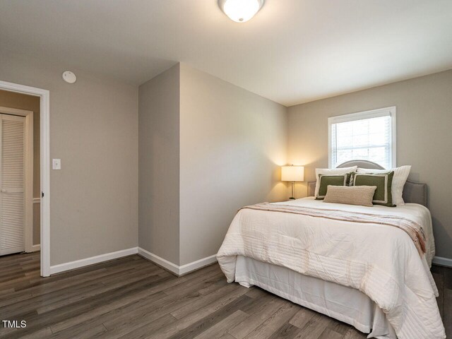1612 Bethlehem Rd, Knightdale, NC 27545 - bedroom featuring wood finished floors and baseboards