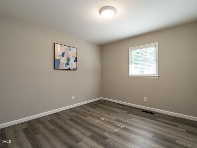 1612 Bethlehem Rd, Knightdale, NC 27545 - unfurnished room featuring dark wood-style flooring and baseboards
