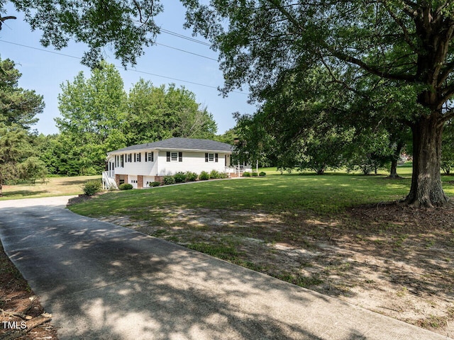 1612 Bethlehem Rd, Knightdale, NC 27545 - view of front of house with concrete driveway and a front yard