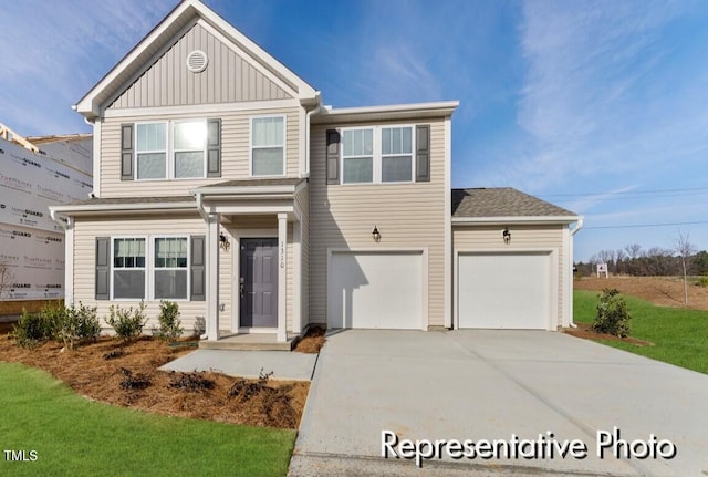 260 Curling Creek Dr Unit 235P, Clayton, NC 27527 - view of front of property featuring driveway, board and batten siding, and an attached garage