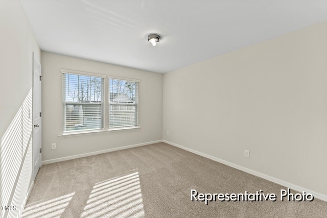 260 Curling Creek Dr Unit 235P, Clayton, NC 27527 - carpeted empty room featuring baseboards