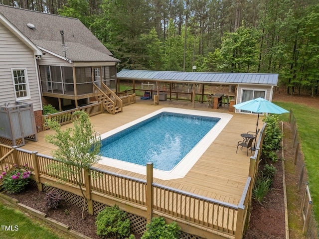 3653 Range Rd, Stem, NC 27581 - view of swimming pool featuring a wooden deck and a sunroom
