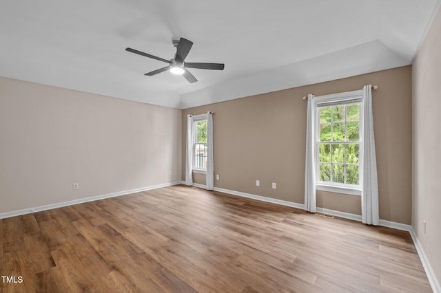 3653 Range Rd, Stem, NC 27581 - unfurnished room featuring healthy amount of natural light, ceiling fan, light wood-type flooring, and baseboards