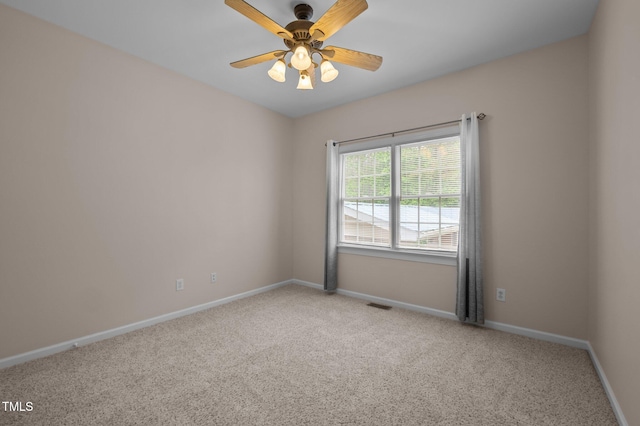 3653 Range Rd, Stem, NC 27581 - empty room featuring carpet, a ceiling fan, and baseboards