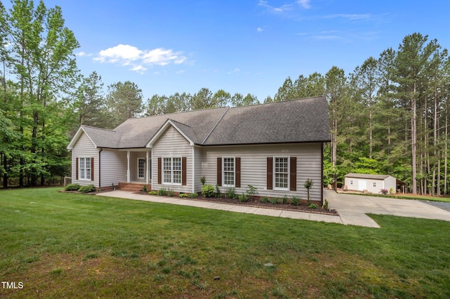 3653 Range Rd, Stem, NC 27581 - single story home with a front yard and roof with shingles