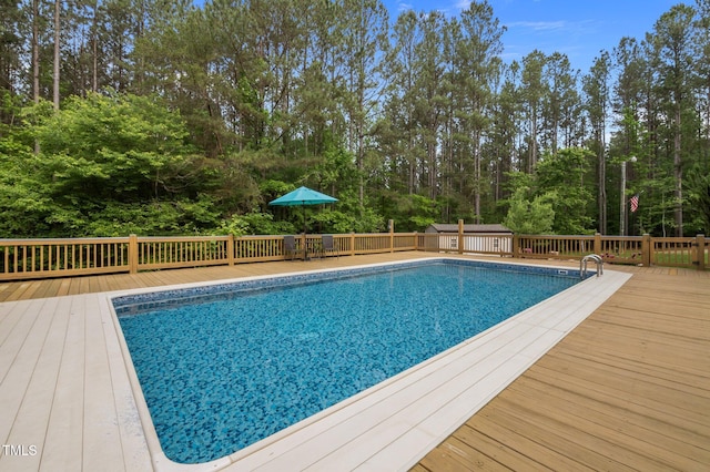 3653 Range Rd, Stem, NC 27581 - view of pool with a wooden deck