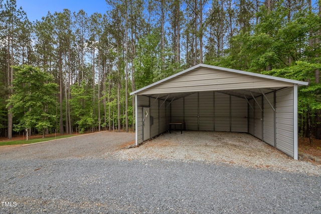 3653 Range Rd, Stem, NC 27581 - garage with a detached carport and driveway