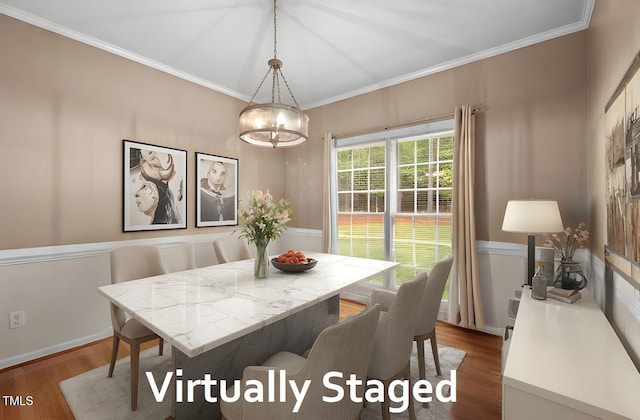 3653 Range Rd, Stem, NC 27581 - dining space featuring wood finished floors, ornamental molding, and a chandelier