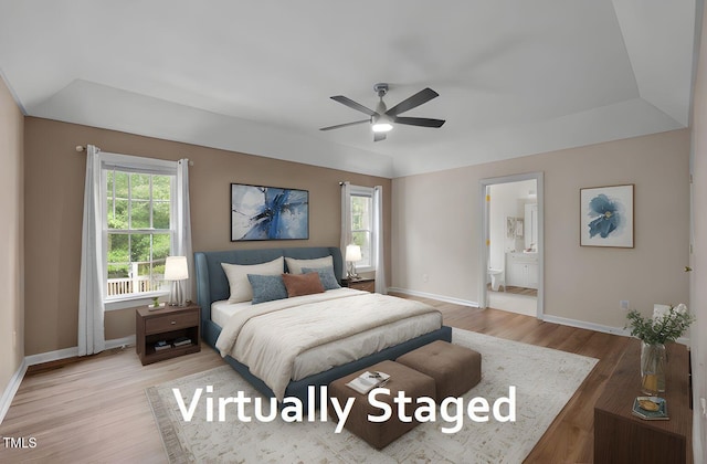3653 Range Rd, Stem, NC 27581 - bedroom featuring light wood-style flooring, baseboards, and ensuite bathroom