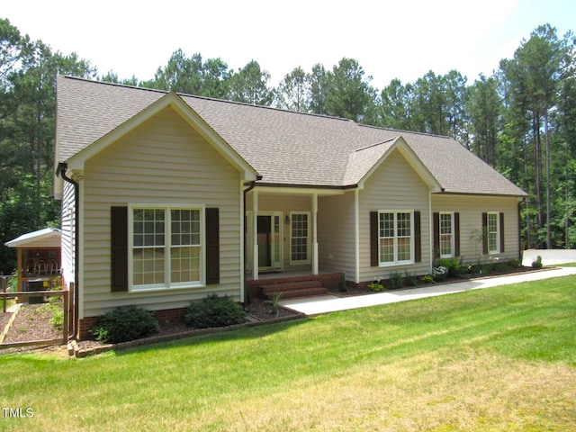 3653 Range Rd, Stem, NC 27581 - single story home with a front yard and a shingled roof