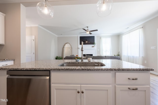 4524 Sweet Williams Ln NW, Wilson, NC 27896 - kitchen with a sink, ornamental molding, dishwasher, white cabinetry, and open floor plan