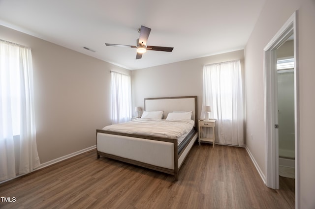 4524 Sweet Williams Ln NW, Wilson, NC 27896 - bedroom featuring baseboards, ceiling fan, visible vents, and wood finished floors