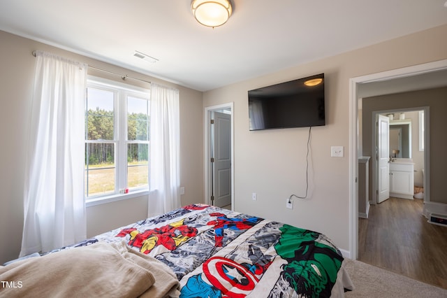 4524 Sweet Williams Ln NW, Wilson, NC 27896 - bedroom featuring baseboards and visible vents
