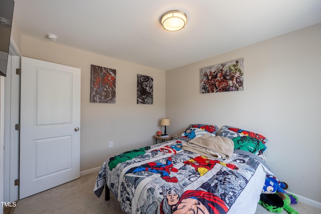 4524 Sweet Williams Ln NW, Wilson, NC 27896 - bedroom featuring baseboards and carpet floors