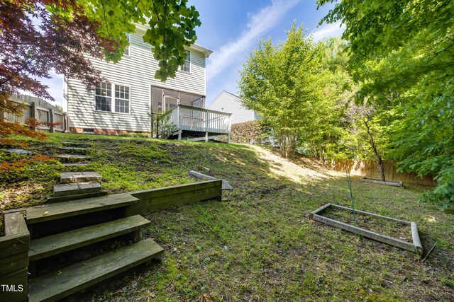 view of yard with a deck