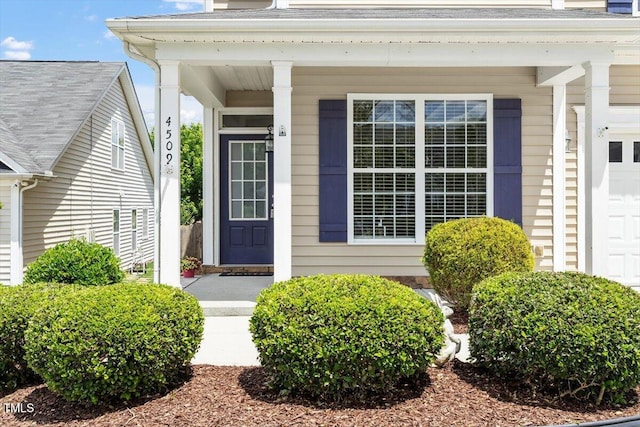 entrance to property with covered porch