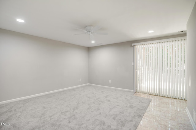 empty room featuring ceiling fan, recessed lighting, and baseboards