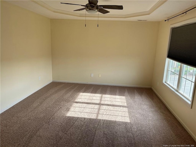 1901 Ellie Ave, Fayetteville, NC 28314 - carpeted empty room featuring a raised ceiling, ceiling fan, and baseboards