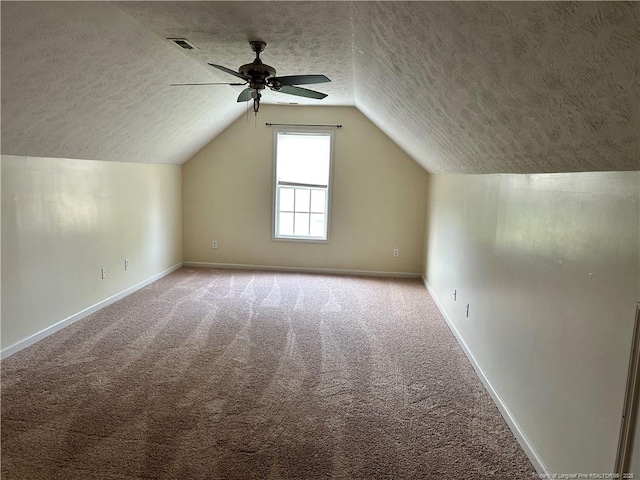 1901 Ellie Ave, Fayetteville, NC 28314 - bonus room with a textured ceiling, ceiling fan, carpet, lofted ceiling, and baseboards