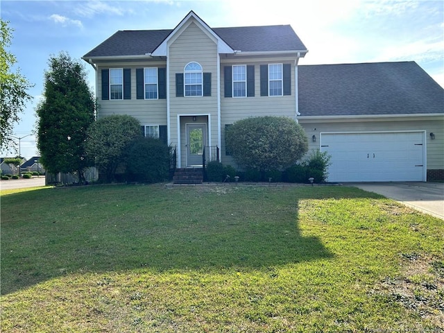 1901 Ellie Ave, Fayetteville, NC 28314 - colonial house with an attached garage, concrete driveway, a front yard, and a shingled roof