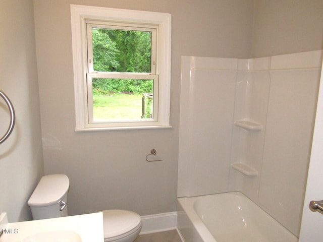 full bathroom with vanity, toilet, and baseboards