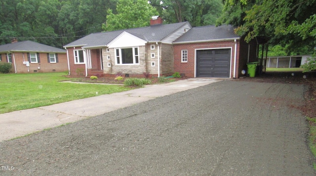1610 W B St, Butner, NC 27509 - ranch-style home with an attached garage, concrete driveway, a front lawn, a chimney, and crawl space