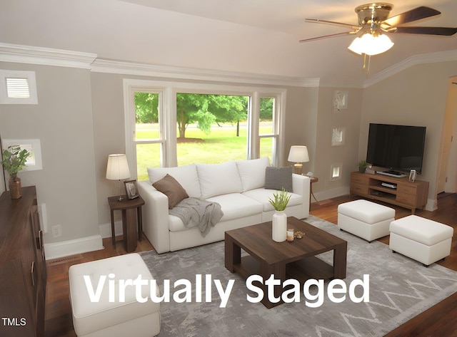 1610 W B St, Butner, NC 27509 - living room with baseboards, crown molding, wood finished floors, and a ceiling fan
