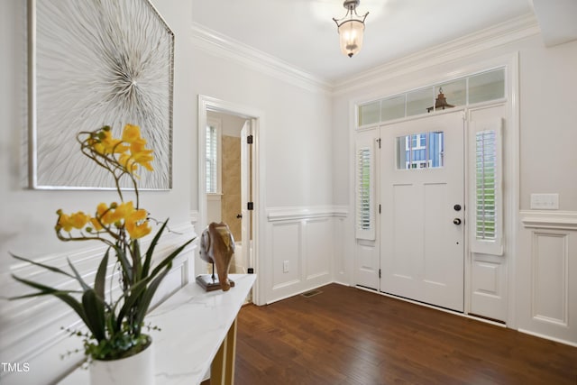 1212 Sand Pine Dr, Cary, NC 27519 - foyer with a wainscoted wall, a decorative wall, ornamental molding, and dark wood-style floors