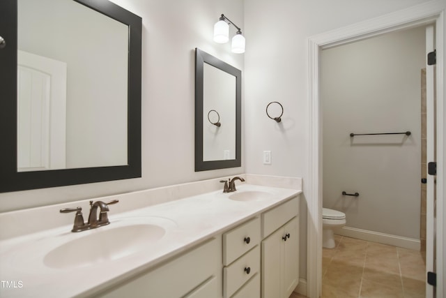 1212 Sand Pine Dr, Cary, NC 27519 - bathroom with double vanity, toilet, tile patterned flooring, and a sink