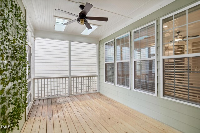 1212 Sand Pine Dr, Cary, NC 27519 - unfurnished sunroom featuring ceiling fan and a skylight